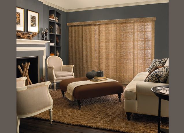 Cleveland Living room with navy walls and tan sliding panel tracks.